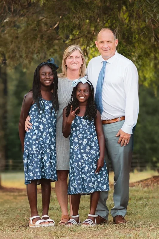 Wayne and Kelli Naugle with their daughters Abbie and Ashlie