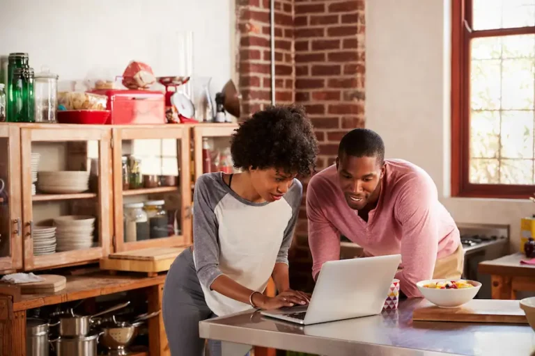 new foster parents reviewing a checklist