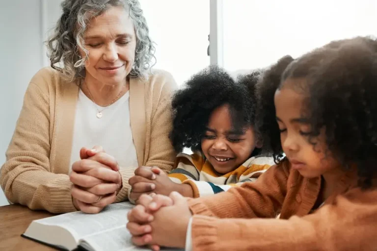 Foster family reading the Bible
