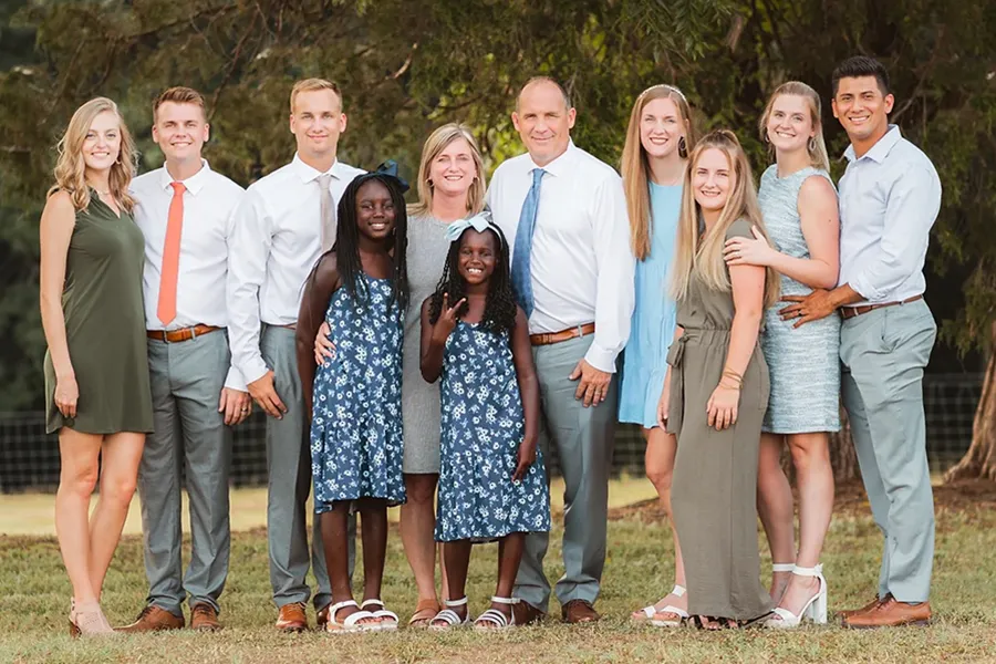 Wayne Naugle with his wife Kelli and their seven children