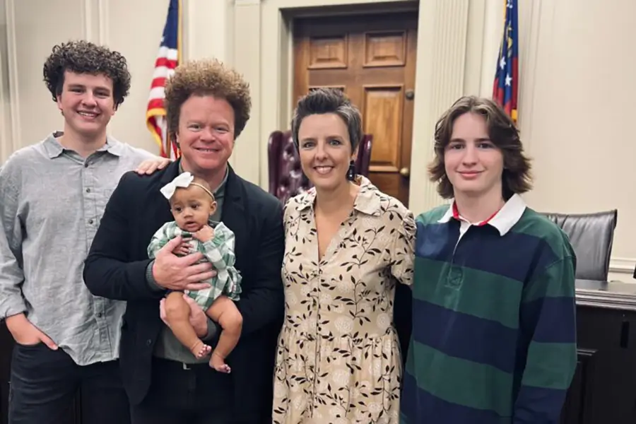 scoggin family at adoption ceremony
