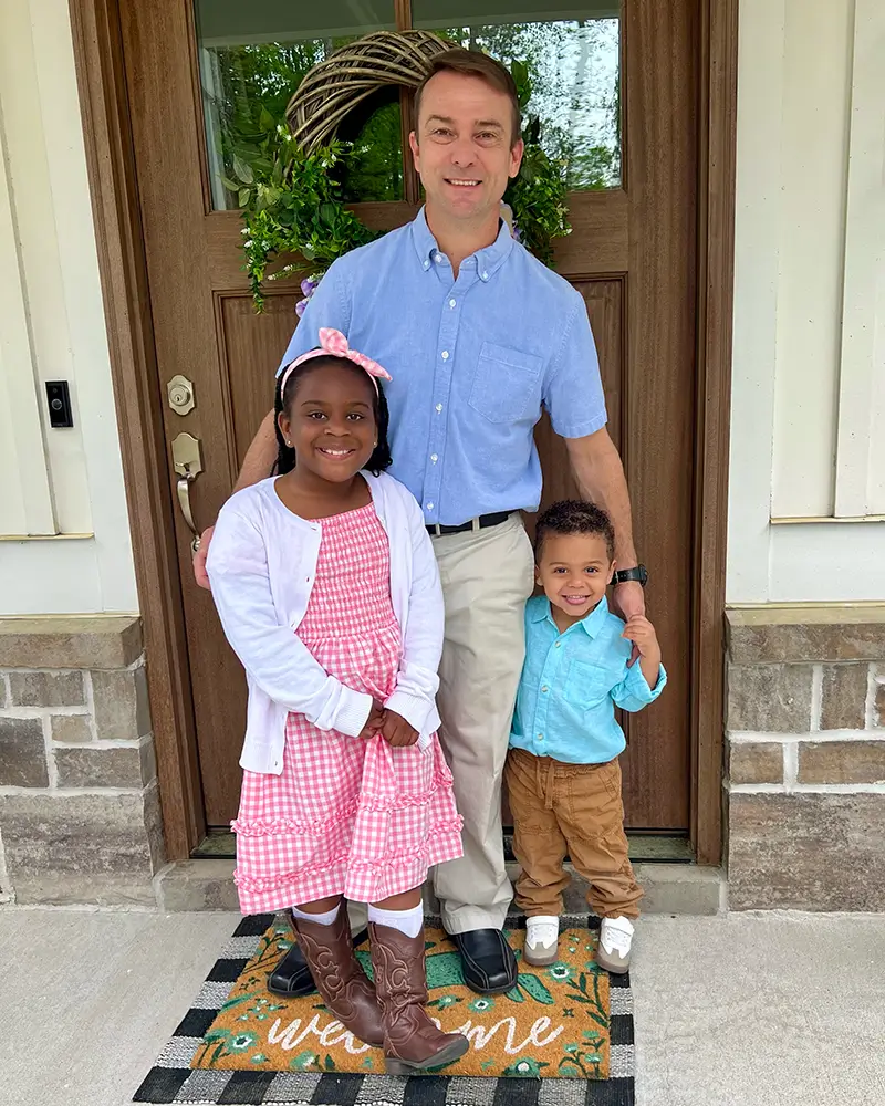 Ken McGuire with Foster Children